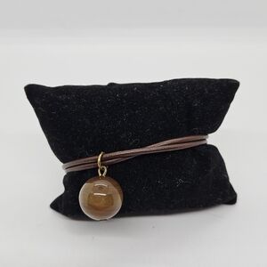 Athens Protasis brown cord bracelet with round brown bead